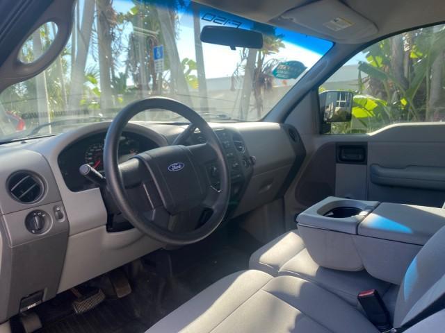 2006 Black /Flint Ford F-150 STX 4 DOOR LOW MILES 92,223 (1FTRX12W56N) with an 4.6L EFI V8 Engine engine, Automatic transmission, located at 4701 North Dixie Hwy, Pompano Beach, FL, 33064, (954) 422-2889, 26.240938, -80.123474 - OUR WEBPAGE FLORIDACARS1.COM HAS OVER 100 PHOTOS AND FREE CARFAX LINK 2006 FORD F-150 XL STX 4 DOOR EXTRA CAB ICE COLD AIR VIN: 1FTRX12W56NA41794 1 F T R X 1 2 W 5 6 N A 4 1 7 9 4 4 DOOR EXTENDED CAB PICKUP 4.6L V8 F GASOLINE 19 MPG REAR WHEEL DRIVE Features ABS Brakes Air Conditioning Alloy Wheels - Photo#48