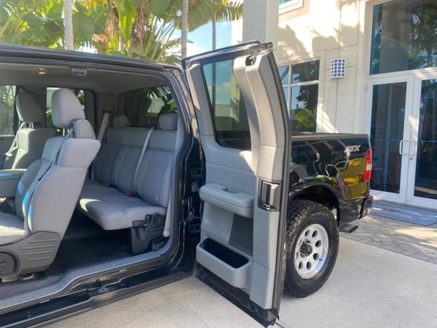 2006 Black /Flint Ford F-150 STX 4 DOOR LOW MILES 92,223 (1FTRX12W56N) with an 4.6L EFI V8 Engine engine, Automatic transmission, located at 4701 North Dixie Hwy, Pompano Beach, FL, 33064, (954) 422-2889, 26.240938, -80.123474 - OUR WEBPAGE FLORIDACARS1.COM HAS OVER 100 PHOTOS AND FREE CARFAX LINK 2006 FORD F-150 XL STX 4 DOOR EXTRA CAB ICE COLD AIR VIN: 1FTRX12W56NA41794 1 F T R X 1 2 W 5 6 N A 4 1 7 9 4 4 DOOR EXTENDED CAB PICKUP 4.6L V8 F GASOLINE 19 MPG REAR WHEEL DRIVE Features ABS Brakes Air Conditioning Alloy Wheels - Photo#72