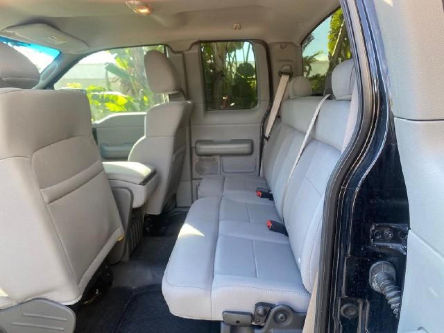 2006 Black /Flint Ford F-150 STX 4 DOOR LOW MILES 92,223 (1FTRX12W56N) with an 4.6L EFI V8 Engine engine, Automatic transmission, located at 4701 North Dixie Hwy, Pompano Beach, FL, 33064, (954) 422-2889, 26.240938, -80.123474 - OUR WEBPAGE FLORIDACARS1.COM HAS OVER 100 PHOTOS AND FREE CARFAX LINK 2006 FORD F-150 XL STX 4 DOOR EXTRA CAB ICE COLD AIR VIN: 1FTRX12W56NA41794 1 F T R X 1 2 W 5 6 N A 4 1 7 9 4 4 DOOR EXTENDED CAB PICKUP 4.6L V8 F GASOLINE 19 MPG REAR WHEEL DRIVE Features ABS Brakes Air Conditioning Alloy Wheels - Photo#80