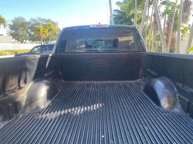 2006 Black /Flint Ford F-150 STX 4 DOOR LOW MILES 92,223 (1FTRX12W56N) with an 4.6L EFI V8 Engine engine, Automatic transmission, located at 4701 North Dixie Hwy, Pompano Beach, FL, 33064, (954) 422-2889, 26.240938, -80.123474 - OUR WEBPAGE FLORIDACARS1.COM HAS OVER 100 PHOTOS AND FREE CARFAX LINK 2006 FORD F-150 XL STX 4 DOOR EXTRA CAB ICE COLD AIR VIN: 1FTRX12W56NA41794 1 F T R X 1 2 W 5 6 N A 4 1 7 9 4 4 DOOR EXTENDED CAB PICKUP 4.6L V8 F GASOLINE 19 MPG REAR WHEEL DRIVE Features ABS Brakes Air Conditioning Alloy Wheels - Photo#96