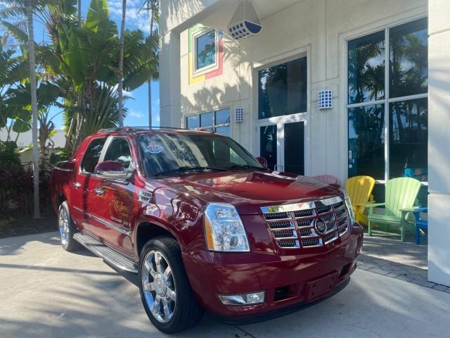 2007 Red E /Ebony/Ebony Cadillac Escalade EXT LOW MILES 13,852 1 OWNER 4WD (3GYFK62857G) with an 6.2L Vortec 1000 VVT V8 SFI Engine engine, Automatic transmission, located at 4701 North Dixie Hwy, Pompano Beach, FL, 33064, (954) 422-2889, 26.240938, -80.123474 - OUR WEBPAGE FLORIDACARS1.COM HAS OVER 100 PHOTOS AND FREE CARFAX LINK 2007 CADILLAC ESCALADE EXT VIN: 3GYFK62857G251462 3 G Y F K 6 2 8 5 7 G 2 5 1 4 6 2 SPORT PICKUP 6.2L V8 F GASOLINE 19 MPG ALL WHEEL DRIVE Features 20 Inch Plus Wheels 4WD/AWD A/C Seat(s) ABS Brakes Air Conditioning Alloy Wheels A - Photo#1