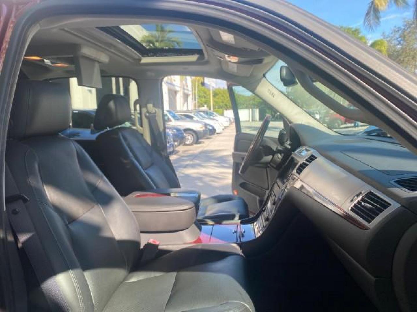 2007 Red E /Ebony/Ebony Cadillac Escalade EXT LOW MILES 15,019 1 OWNER 4WD (3GYFK62857G) with an 6.2L Vortec 1000 VVT V8 SFI Engine engine, Automatic transmission, located at 4701 North Dixie Hwy, Pompano Beach, FL, 33064, (954) 422-2889, 26.240938, -80.123474 - OUR WEBPAGE FLORIDACARS1.COM HAS OVER 100 PHOTOS AND FREE CARFAX LINK 2007 CADILLAC ESCALADE EXT VIN: 3GYFK62857G251462 3 G Y F K 6 2 8 5 7 G 2 5 1 4 6 2 SPORT PICKUP 6.2L V8 F GASOLINE 19 MPG ALL WHEEL DRIVE Features 20 Inch Plus Wheels 4WD/AWD A/C Seat(s) ABS Brakes Air Conditioning Alloy Wheels A - Photo#12