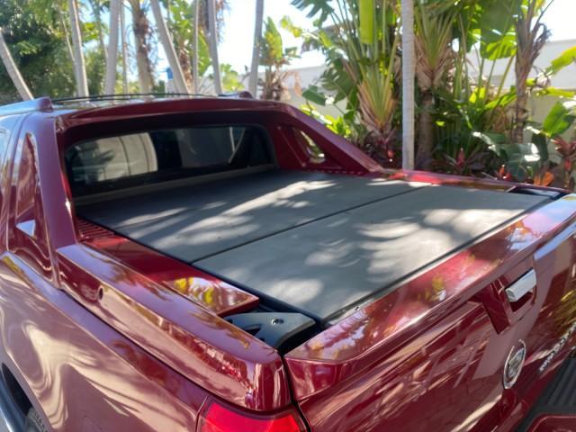 2007 Red E /Ebony/Ebony Cadillac Escalade EXT LOW MILES 13,852 1 OWNER 4WD (3GYFK62857G) with an 6.2L Vortec 1000 VVT V8 SFI Engine engine, Automatic transmission, located at 4701 North Dixie Hwy, Pompano Beach, FL, 33064, (954) 422-2889, 26.240938, -80.123474 - OUR WEBPAGE FLORIDACARS1.COM HAS OVER 100 PHOTOS AND FREE CARFAX LINK 2007 CADILLAC ESCALADE EXT VIN: 3GYFK62857G251462 3 G Y F K 6 2 8 5 7 G 2 5 1 4 6 2 SPORT PICKUP 6.2L V8 F GASOLINE 19 MPG ALL WHEEL DRIVE Features 20 Inch Plus Wheels 4WD/AWD A/C Seat(s) ABS Brakes Air Conditioning Alloy Wheels A - Photo#59