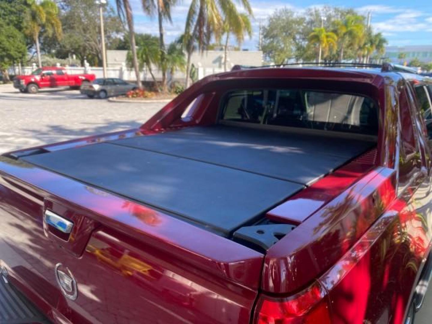 2007 Red E /Ebony/Ebony Cadillac Escalade EXT LOW MILES 15,019 1 OWNER 4WD (3GYFK62857G) with an 6.2L Vortec 1000 VVT V8 SFI Engine engine, Automatic transmission, located at 4701 North Dixie Hwy, Pompano Beach, FL, 33064, (954) 422-2889, 26.240938, -80.123474 - OUR WEBPAGE FLORIDACARS1.COM HAS OVER 100 PHOTOS AND FREE CARFAX LINK 2007 CADILLAC ESCALADE EXT VIN: 3GYFK62857G251462 3 G Y F K 6 2 8 5 7 G 2 5 1 4 6 2 SPORT PICKUP 6.2L V8 F GASOLINE 19 MPG ALL WHEEL DRIVE Features 20 Inch Plus Wheels 4WD/AWD A/C Seat(s) ABS Brakes Air Conditioning Alloy Wheels A - Photo#61
