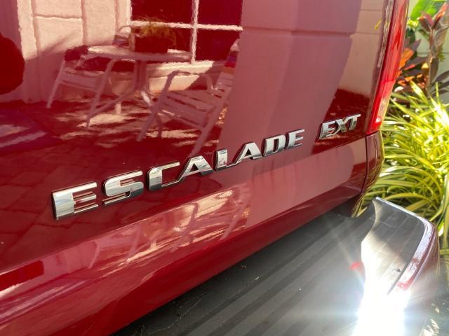 2007 Red E /Ebony/Ebony Cadillac Escalade EXT LOW MILES 13,852 1 OWNER 4WD (3GYFK62857G) with an 6.2L Vortec 1000 VVT V8 SFI Engine engine, Automatic transmission, located at 4701 North Dixie Hwy, Pompano Beach, FL, 33064, (954) 422-2889, 26.240938, -80.123474 - OUR WEBPAGE FLORIDACARS1.COM HAS OVER 100 PHOTOS AND FREE CARFAX LINK 2007 CADILLAC ESCALADE EXT VIN: 3GYFK62857G251462 3 G Y F K 6 2 8 5 7 G 2 5 1 4 6 2 SPORT PICKUP 6.2L V8 F GASOLINE 19 MPG ALL WHEEL DRIVE Features 20 Inch Plus Wheels 4WD/AWD A/C Seat(s) ABS Brakes Air Conditioning Alloy Wheels A - Photo#63