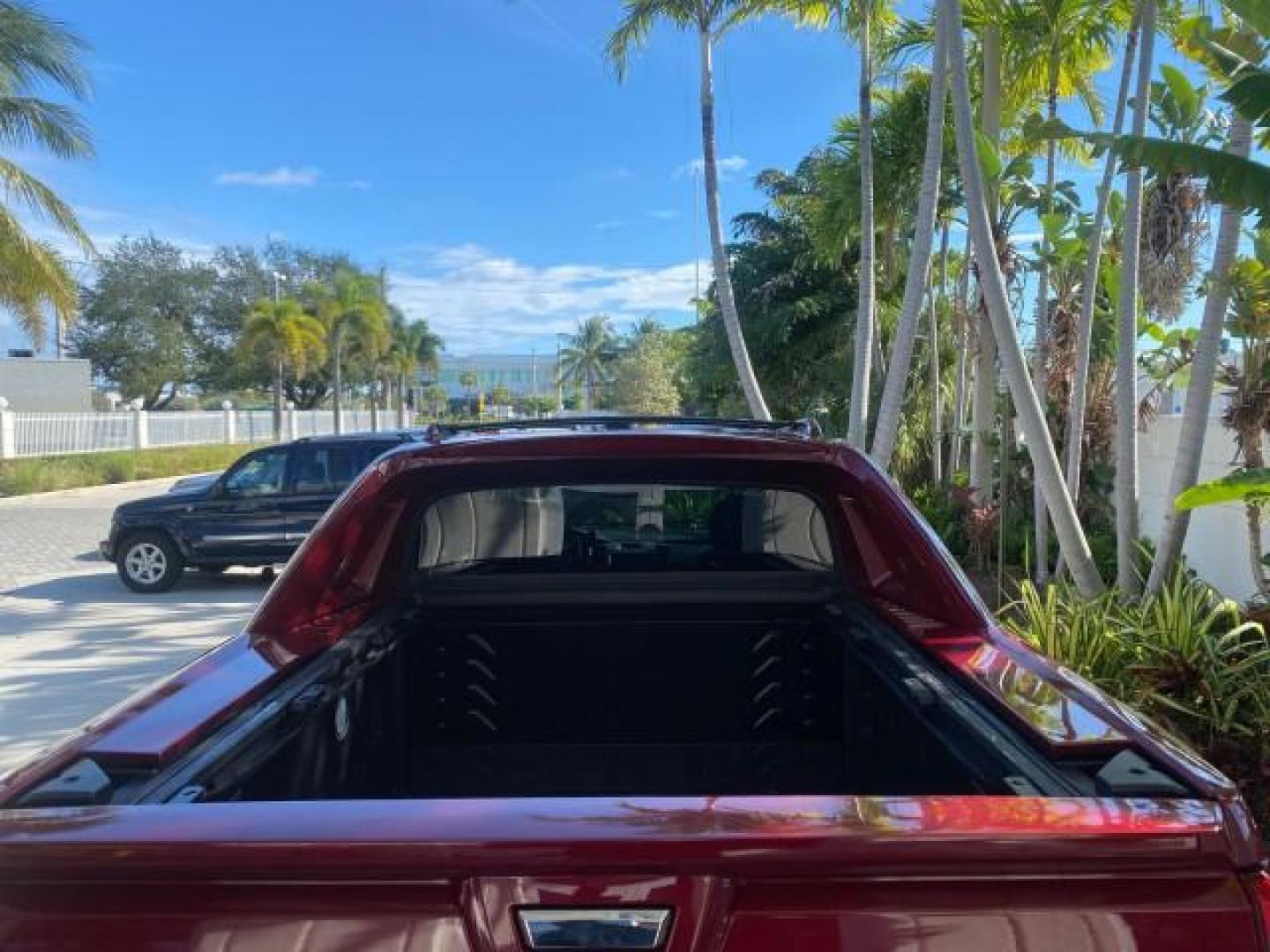2007 Red E /Ebony/Ebony Cadillac Escalade EXT LOW MILES 15,019 1 OWNER 4WD (3GYFK62857G) with an 6.2L Vortec 1000 VVT V8 SFI Engine engine, Automatic transmission, located at 4701 North Dixie Hwy, Pompano Beach, FL, 33064, (954) 422-2889, 26.240938, -80.123474 - OUR WEBPAGE FLORIDACARS1.COM HAS OVER 100 PHOTOS AND FREE CARFAX LINK 2007 CADILLAC ESCALADE EXT VIN: 3GYFK62857G251462 3 G Y F K 6 2 8 5 7 G 2 5 1 4 6 2 SPORT PICKUP 6.2L V8 F GASOLINE 19 MPG ALL WHEEL DRIVE Features 20 Inch Plus Wheels 4WD/AWD A/C Seat(s) ABS Brakes Air Conditioning Alloy Wheels A - Photo#75
