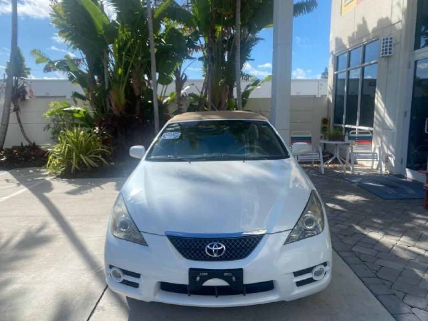 2007 Blizzard Pearl /Ivory Toyota Camry Solara SLE LOW MILES 59,911 SOFT TOP (4T1FA38P07U) with an 3.3L DOHC SMPI VVT-i 24-Valve V6 Engine engine, Automatic transmission, located at 4701 North Dixie Hwy, Pompano Beach, FL, 33064, (954) 422-2889, 26.240938, -80.123474 - OUR WEBPAGE FLORIDACARS1.COM HAS OVER 100 PHOTOS AND FREE CARFAX LINK 2007 TOYOTA CAMRY SOLARA SLE V6 VIN: 4T1FA38P07U119420 4 T 1 F A 3 8 P 0 7 U 1 1 9 4 2 0 CONVERTIBLE 3.3L V6 F DOHC 24V GASOLINE 29 MPG FRONT WHEEL DRIVE Features ABS Brakes Air Conditioning Alloy Wheels AM/FM Stereo Automatic Tra - Photo#2