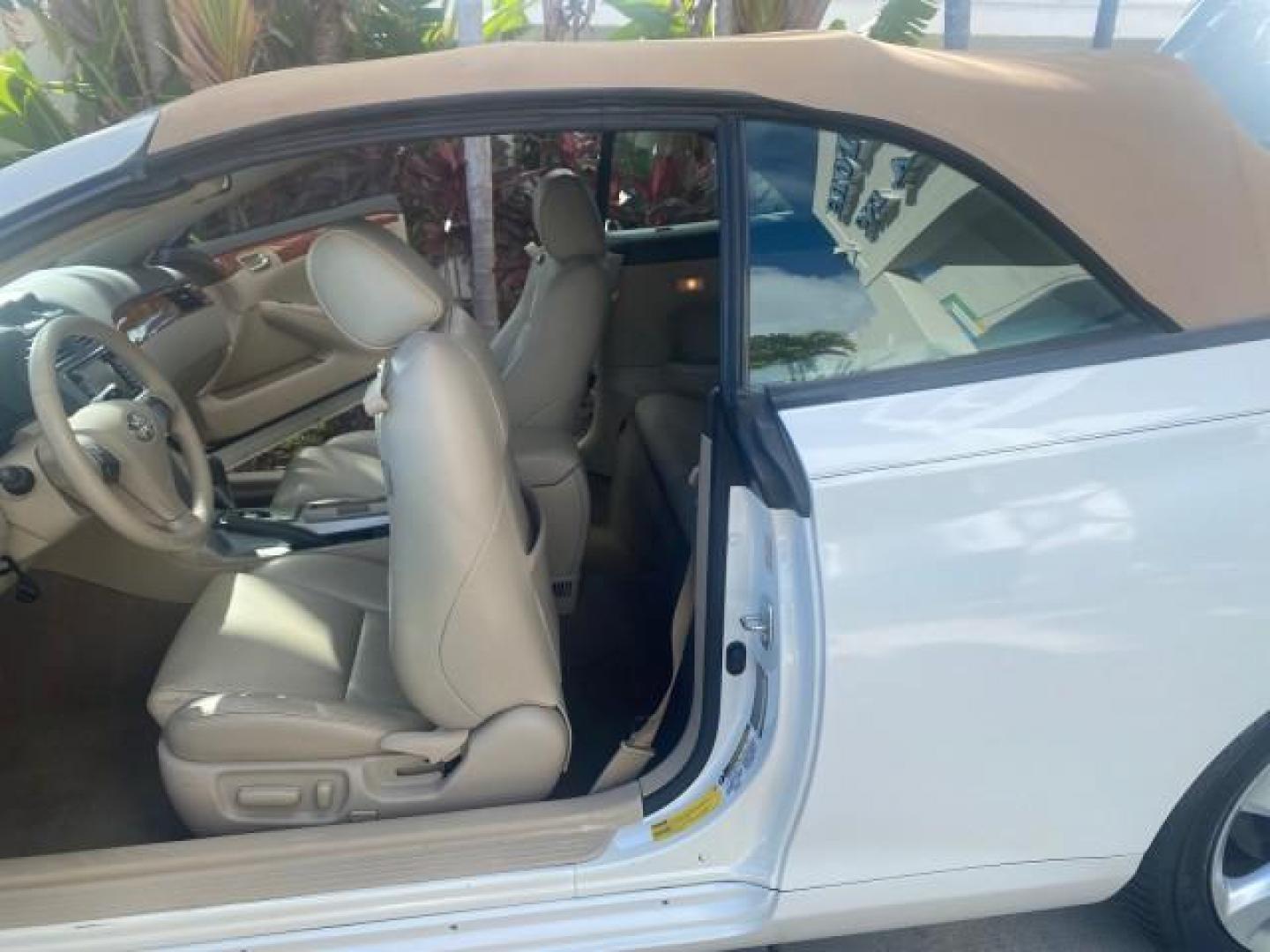 2007 Blizzard Pearl /Ivory Toyota Camry Solara SLE LOW MILES 59,911 SOFT TOP (4T1FA38P07U) with an 3.3L DOHC SMPI VVT-i 24-Valve V6 Engine engine, Automatic transmission, located at 4701 North Dixie Hwy, Pompano Beach, FL, 33064, (954) 422-2889, 26.240938, -80.123474 - OUR WEBPAGE FLORIDACARS1.COM HAS OVER 100 PHOTOS AND FREE CARFAX LINK 2007 TOYOTA CAMRY SOLARA SLE V6 VIN: 4T1FA38P07U119420 4 T 1 F A 3 8 P 0 7 U 1 1 9 4 2 0 CONVERTIBLE 3.3L V6 F DOHC 24V GASOLINE 29 MPG FRONT WHEEL DRIVE Features ABS Brakes Air Conditioning Alloy Wheels AM/FM Stereo Automatic Tra - Photo#13