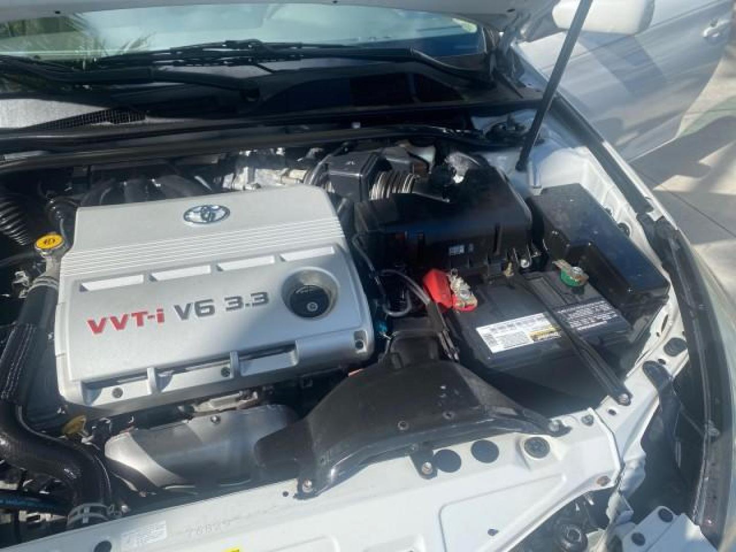 2007 Blizzard Pearl /Ivory Toyota Camry Solara SLE LOW MILES 59,911 SOFT TOP (4T1FA38P07U) with an 3.3L DOHC SMPI VVT-i 24-Valve V6 Engine engine, Automatic transmission, located at 4701 North Dixie Hwy, Pompano Beach, FL, 33064, (954) 422-2889, 26.240938, -80.123474 - OUR WEBPAGE FLORIDACARS1.COM HAS OVER 100 PHOTOS AND FREE CARFAX LINK 2007 TOYOTA CAMRY SOLARA SLE V6 VIN: 4T1FA38P07U119420 4 T 1 F A 3 8 P 0 7 U 1 1 9 4 2 0 CONVERTIBLE 3.3L V6 F DOHC 24V GASOLINE 29 MPG FRONT WHEEL DRIVE Features ABS Brakes Air Conditioning Alloy Wheels AM/FM Stereo Automatic Tra - Photo#25