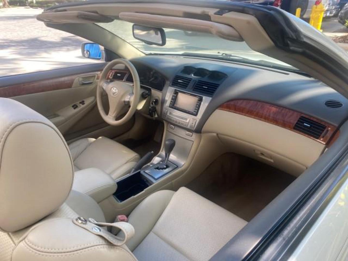 2007 Blizzard Pearl /Ivory Toyota Camry Solara SLE LOW MILES 59,911 SOFT TOP (4T1FA38P07U) with an 3.3L DOHC SMPI VVT-i 24-Valve V6 Engine engine, Automatic transmission, located at 4701 North Dixie Hwy, Pompano Beach, FL, 33064, (954) 422-2889, 26.240938, -80.123474 - OUR WEBPAGE FLORIDACARS1.COM HAS OVER 100 PHOTOS AND FREE CARFAX LINK 2007 TOYOTA CAMRY SOLARA SLE V6 VIN: 4T1FA38P07U119420 4 T 1 F A 3 8 P 0 7 U 1 1 9 4 2 0 CONVERTIBLE 3.3L V6 F DOHC 24V GASOLINE 29 MPG FRONT WHEEL DRIVE Features ABS Brakes Air Conditioning Alloy Wheels AM/FM Stereo Automatic Tra - Photo#57