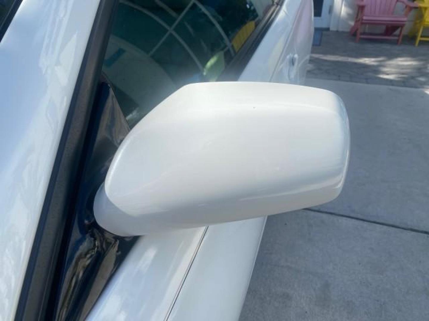 2007 Blizzard Pearl /Ivory Toyota Camry Solara SLE LOW MILES 59,911 SOFT TOP (4T1FA38P07U) with an 3.3L DOHC SMPI VVT-i 24-Valve V6 Engine engine, Automatic transmission, located at 4701 North Dixie Hwy, Pompano Beach, FL, 33064, (954) 422-2889, 26.240938, -80.123474 - OUR WEBPAGE FLORIDACARS1.COM HAS OVER 100 PHOTOS AND FREE CARFAX LINK 2007 TOYOTA CAMRY SOLARA SLE V6 VIN: 4T1FA38P07U119420 4 T 1 F A 3 8 P 0 7 U 1 1 9 4 2 0 CONVERTIBLE 3.3L V6 F DOHC 24V GASOLINE 29 MPG FRONT WHEEL DRIVE Features ABS Brakes Air Conditioning Alloy Wheels AM/FM Stereo Automatic Tra - Photo#65