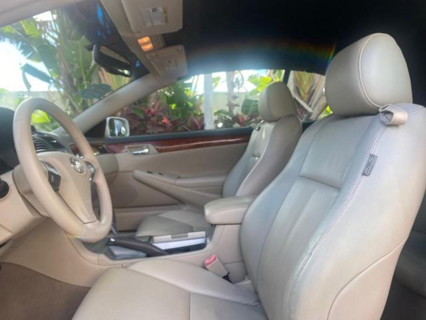 2007 Blizzard Pearl /Ivory Toyota Camry Solara SLE LOW MILES 59,911 SOFT TOP (4T1FA38P07U) with an 3.3L DOHC SMPI VVT-i 24-Valve V6 Engine engine, Automatic transmission, located at 4701 North Dixie Hwy, Pompano Beach, FL, 33064, (954) 422-2889, 26.240938, -80.123474 - OUR WEBPAGE FLORIDACARS1.COM HAS OVER 100 PHOTOS AND FREE CARFAX LINK 2007 TOYOTA CAMRY SOLARA SLE V6 VIN: 4T1FA38P07U119420 4 T 1 F A 3 8 P 0 7 U 1 1 9 4 2 0 CONVERTIBLE 3.3L V6 F DOHC 24V GASOLINE 29 MPG FRONT WHEEL DRIVE Features ABS Brakes Air Conditioning Alloy Wheels AM/FM Stereo Automatic Tra - Photo#69