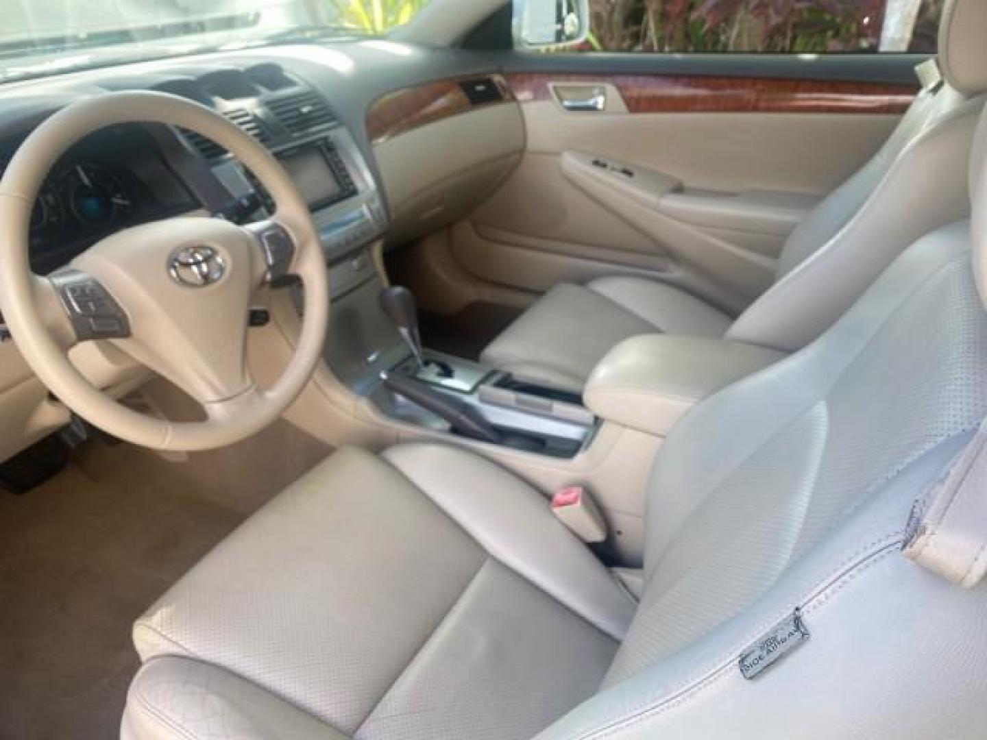 2007 Blizzard Pearl /Ivory Toyota Camry Solara SLE LOW MILES 59,911 SOFT TOP (4T1FA38P07U) with an 3.3L DOHC SMPI VVT-i 24-Valve V6 Engine engine, Automatic transmission, located at 4701 North Dixie Hwy, Pompano Beach, FL, 33064, (954) 422-2889, 26.240938, -80.123474 - OUR WEBPAGE FLORIDACARS1.COM HAS OVER 100 PHOTOS AND FREE CARFAX LINK 2007 TOYOTA CAMRY SOLARA SLE V6 VIN: 4T1FA38P07U119420 4 T 1 F A 3 8 P 0 7 U 1 1 9 4 2 0 CONVERTIBLE 3.3L V6 F DOHC 24V GASOLINE 29 MPG FRONT WHEEL DRIVE Features ABS Brakes Air Conditioning Alloy Wheels AM/FM Stereo Automatic Tra - Photo#70