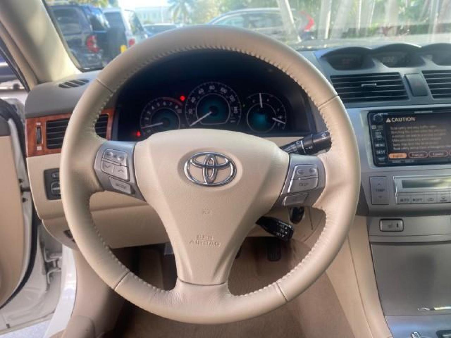 2007 Blizzard Pearl /Ivory Toyota Camry Solara SLE LOW MILES 59,911 SOFT TOP (4T1FA38P07U) with an 3.3L DOHC SMPI VVT-i 24-Valve V6 Engine engine, Automatic transmission, located at 4701 North Dixie Hwy, Pompano Beach, FL, 33064, (954) 422-2889, 26.240938, -80.123474 - OUR WEBPAGE FLORIDACARS1.COM HAS OVER 100 PHOTOS AND FREE CARFAX LINK 2007 TOYOTA CAMRY SOLARA SLE V6 VIN: 4T1FA38P07U119420 4 T 1 F A 3 8 P 0 7 U 1 1 9 4 2 0 CONVERTIBLE 3.3L V6 F DOHC 24V GASOLINE 29 MPG FRONT WHEEL DRIVE Features ABS Brakes Air Conditioning Alloy Wheels AM/FM Stereo Automatic Tra - Photo#72