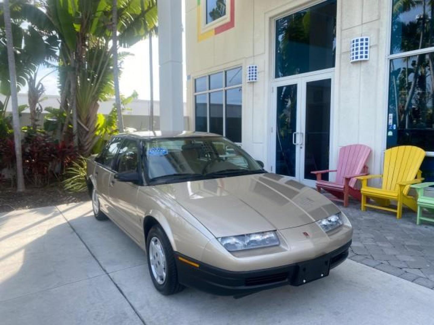 1995 Gold /Tan Saturn SL LOW MILES 70,805 (1G8ZH5282SZ) with an 1.9L 4-Cyl Engine engine, Automatic transmission, located at 4701 North Dixie Hwy, Pompano Beach, FL, 33064, (954) 422-2889, 26.240938, -80.123474 - OUR WEBPAGE FLORIDACARS1.COM HAS OVER 100 PHOTOS AND FREE CARFAX LINK 1995 SATURN S-SERIES SL1 ONE OF A KIND FIND DRIVES AMAZING VERY DEPENDABLE VIN: 1G8ZH5282SZ152130 1 G 8 Z H 5 2 8 2 S Z 1 5 2 1 3 0 SEDAN 4 DR 1.9L I4 F SOHC GASOLINE FRONT WHEEL DRIVE Features Air Conditioning AM/FM Stereo Automa - Photo#1