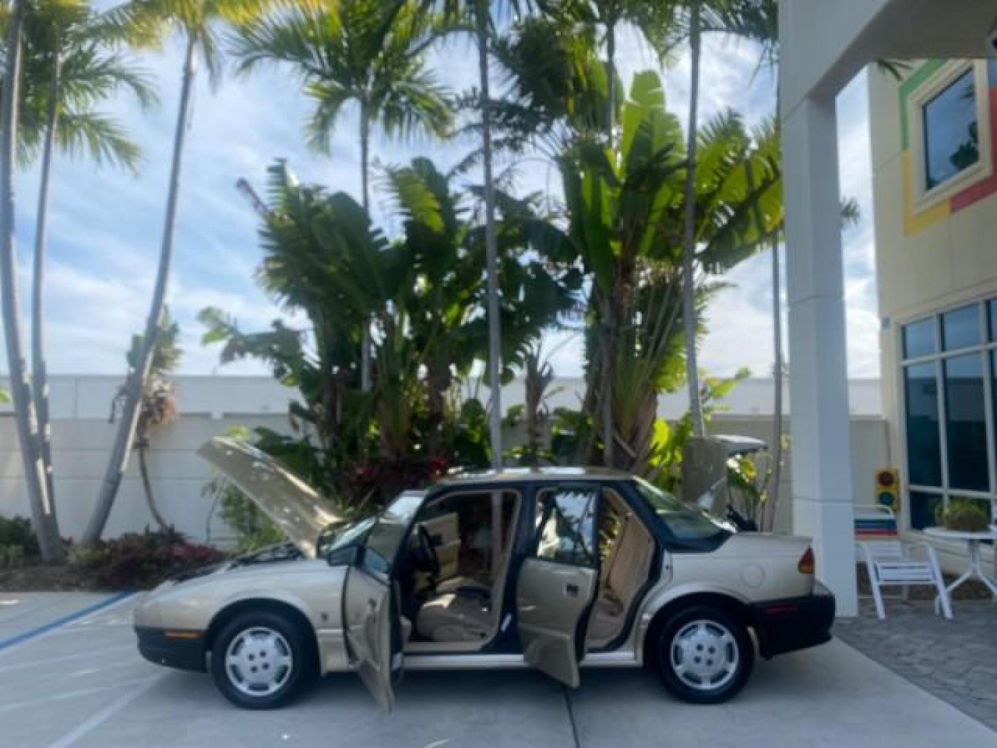 1995 Gold /Tan Saturn SL LOW MILES 70,805 (1G8ZH5282SZ) with an 1.9L 4-Cyl Engine engine, Automatic transmission, located at 4701 North Dixie Hwy, Pompano Beach, FL, 33064, (954) 422-2889, 26.240938, -80.123474 - OUR WEBPAGE FLORIDACARS1.COM HAS OVER 100 PHOTOS AND FREE CARFAX LINK 1995 SATURN S-SERIES SL1 ONE OF A KIND FIND DRIVES AMAZING VERY DEPENDABLE VIN: 1G8ZH5282SZ152130 1 G 8 Z H 5 2 8 2 S Z 1 5 2 1 3 0 SEDAN 4 DR 1.9L I4 F SOHC GASOLINE FRONT WHEEL DRIVE Features Air Conditioning AM/FM Stereo Automa - Photo#8