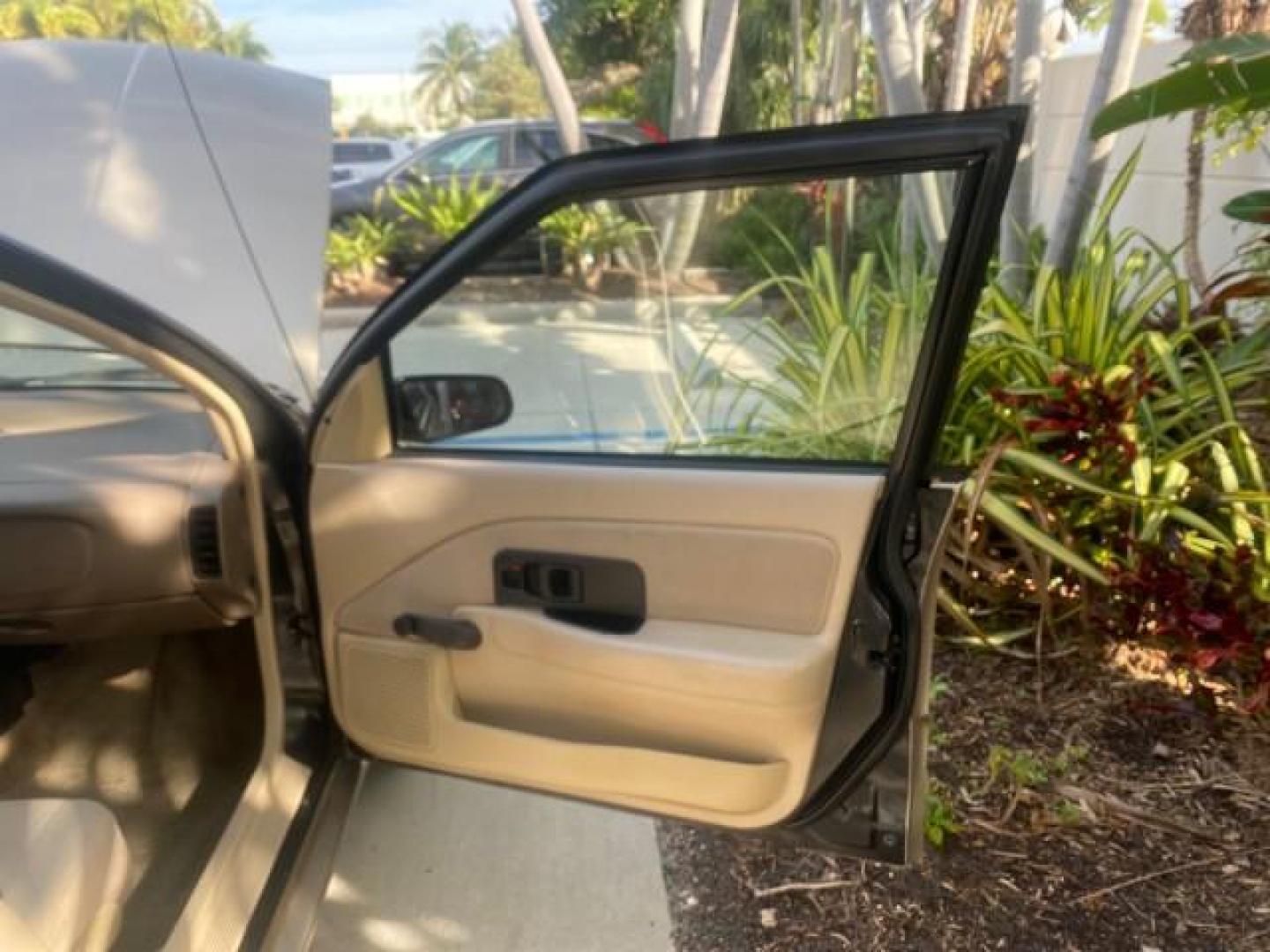 1995 Gold /Tan Saturn SL LOW MILES 70,805 (1G8ZH5282SZ) with an 1.9L 4-Cyl Engine engine, Automatic transmission, located at 4701 North Dixie Hwy, Pompano Beach, FL, 33064, (954) 422-2889, 26.240938, -80.123474 - OUR WEBPAGE FLORIDACARS1.COM HAS OVER 100 PHOTOS AND FREE CARFAX LINK 1995 SATURN S-SERIES SL1 ONE OF A KIND FIND DRIVES AMAZING VERY DEPENDABLE VIN: 1G8ZH5282SZ152130 1 G 8 Z H 5 2 8 2 S Z 1 5 2 1 3 0 SEDAN 4 DR 1.9L I4 F SOHC GASOLINE FRONT WHEEL DRIVE Features Air Conditioning AM/FM Stereo Automa - Photo#11