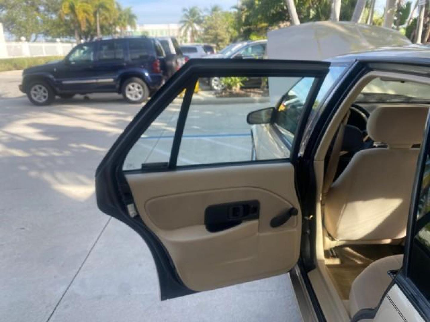 1995 Gold /Tan Saturn SL LOW MILES 70,805 (1G8ZH5282SZ) with an 1.9L 4-Cyl Engine engine, Automatic transmission, located at 4701 North Dixie Hwy, Pompano Beach, FL, 33064, (954) 422-2889, 26.240938, -80.123474 - OUR WEBPAGE FLORIDACARS1.COM HAS OVER 100 PHOTOS AND FREE CARFAX LINK 1995 SATURN S-SERIES SL1 ONE OF A KIND FIND DRIVES AMAZING VERY DEPENDABLE VIN: 1G8ZH5282SZ152130 1 G 8 Z H 5 2 8 2 S Z 1 5 2 1 3 0 SEDAN 4 DR 1.9L I4 F SOHC GASOLINE FRONT WHEEL DRIVE Features Air Conditioning AM/FM Stereo Automa - Photo#13