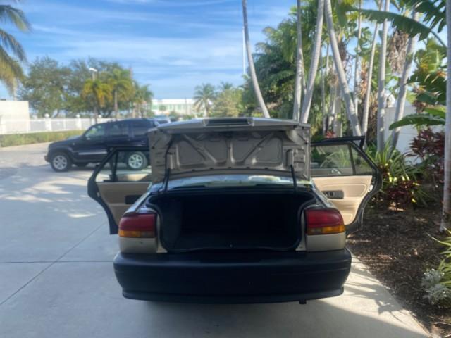 1995 Gold /Tan Saturn SL LOW MILES 70,805 (1G8ZH5282SZ) with an 1.9L 4-Cyl Engine engine, Automatic transmission, located at 4701 North Dixie Hwy, Pompano Beach, FL, 33064, (954) 422-2889, 26.240938, -80.123474 - OUR WEBPAGE FLORIDACARS1.COM HAS OVER 100 PHOTOS AND FREE CARFAX LINK 1995 SATURN S-SERIES SL1 ONE OF A KIND FIND DRIVES AMAZING VERY DEPENDABLE VIN: 1G8ZH5282SZ152130 1 G 8 Z H 5 2 8 2 S Z 1 5 2 1 3 0 SEDAN 4 DR 1.9L I4 F SOHC GASOLINE FRONT WHEEL DRIVE Features Air Conditioning AM/FM Stereo Automa - Photo#15