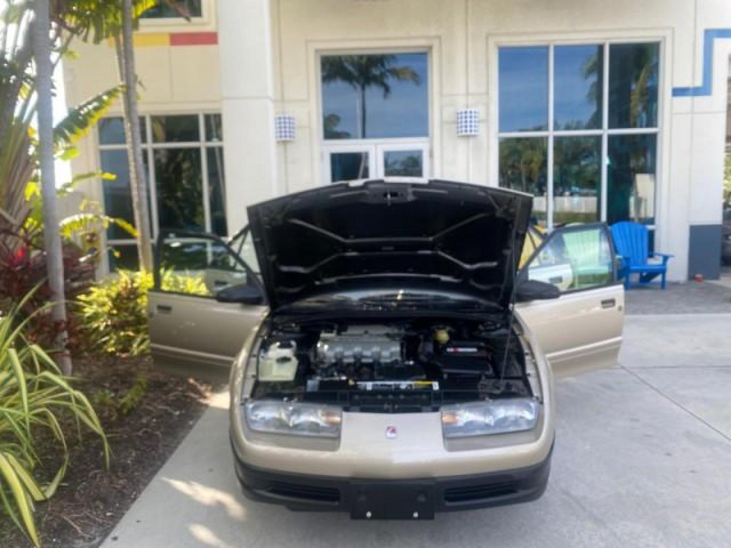 1995 Gold /Tan Saturn SL LOW MILES 70,805 (1G8ZH5282SZ) with an 1.9L 4-Cyl Engine engine, Automatic transmission, located at 4701 North Dixie Hwy, Pompano Beach, FL, 33064, (954) 422-2889, 26.240938, -80.123474 - OUR WEBPAGE FLORIDACARS1.COM HAS OVER 100 PHOTOS AND FREE CARFAX LINK 1995 SATURN S-SERIES SL1 ONE OF A KIND FIND DRIVES AMAZING VERY DEPENDABLE VIN: 1G8ZH5282SZ152130 1 G 8 Z H 5 2 8 2 S Z 1 5 2 1 3 0 SEDAN 4 DR 1.9L I4 F SOHC GASOLINE FRONT WHEEL DRIVE Features Air Conditioning AM/FM Stereo Automa - Photo#17