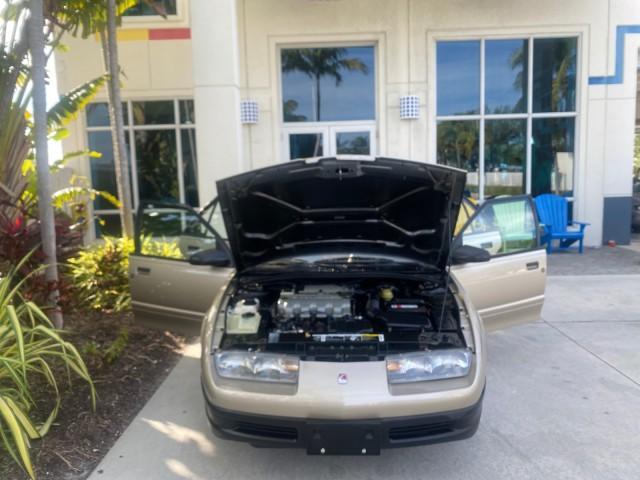 1995 Gold /Tan Saturn SL LOW MILES 70,805 (1G8ZH5282SZ) with an 1.9L 4-Cyl Engine engine, Automatic transmission, located at 4701 North Dixie Hwy, Pompano Beach, FL, 33064, (954) 422-2889, 26.240938, -80.123474 - OUR WEBPAGE FLORIDACARS1.COM HAS OVER 100 PHOTOS AND FREE CARFAX LINK 1995 SATURN S-SERIES SL1 ONE OF A KIND FIND DRIVES AMAZING VERY DEPENDABLE VIN: 1G8ZH5282SZ152130 1 G 8 Z H 5 2 8 2 S Z 1 5 2 1 3 0 SEDAN 4 DR 1.9L I4 F SOHC GASOLINE FRONT WHEEL DRIVE Features Air Conditioning AM/FM Stereo Automa - Photo#17