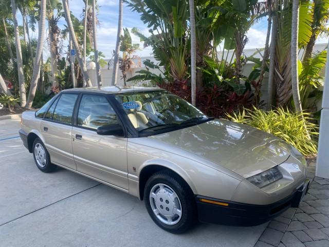 1995 Gold /Tan Saturn SL LOW MILES 70,805 (1G8ZH5282SZ) with an 1.9L 4-Cyl Engine engine, Automatic transmission, located at 4701 North Dixie Hwy, Pompano Beach, FL, 33064, (954) 422-2889, 26.240938, -80.123474 - OUR WEBPAGE FLORIDACARS1.COM HAS OVER 100 PHOTOS AND FREE CARFAX LINK 1995 SATURN S-SERIES SL1 ONE OF A KIND FIND DRIVES AMAZING VERY DEPENDABLE VIN: 1G8ZH5282SZ152130 1 G 8 Z H 5 2 8 2 S Z 1 5 2 1 3 0 SEDAN 4 DR 1.9L I4 F SOHC GASOLINE FRONT WHEEL DRIVE Features Air Conditioning AM/FM Stereo Automa - Photo#24
