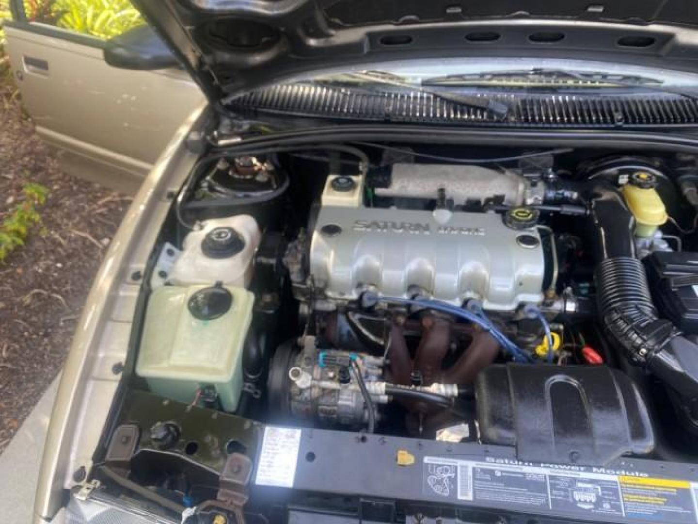 1995 Gold /Tan Saturn SL LOW MILES 70,805 (1G8ZH5282SZ) with an 1.9L 4-Cyl Engine engine, Automatic transmission, located at 4701 North Dixie Hwy, Pompano Beach, FL, 33064, (954) 422-2889, 26.240938, -80.123474 - OUR WEBPAGE FLORIDACARS1.COM HAS OVER 100 PHOTOS AND FREE CARFAX LINK 1995 SATURN S-SERIES SL1 ONE OF A KIND FIND DRIVES AMAZING VERY DEPENDABLE VIN: 1G8ZH5282SZ152130 1 G 8 Z H 5 2 8 2 S Z 1 5 2 1 3 0 SEDAN 4 DR 1.9L I4 F SOHC GASOLINE FRONT WHEEL DRIVE Features Air Conditioning AM/FM Stereo Automa - Photo#25