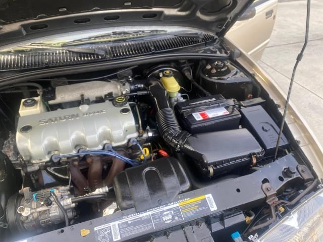 1995 Gold /Tan Saturn SL LOW MILES 70,805 (1G8ZH5282SZ) with an 1.9L 4-Cyl Engine engine, Automatic transmission, located at 4701 North Dixie Hwy, Pompano Beach, FL, 33064, (954) 422-2889, 26.240938, -80.123474 - OUR WEBPAGE FLORIDACARS1.COM HAS OVER 100 PHOTOS AND FREE CARFAX LINK 1995 SATURN S-SERIES SL1 ONE OF A KIND FIND DRIVES AMAZING VERY DEPENDABLE VIN: 1G8ZH5282SZ152130 1 G 8 Z H 5 2 8 2 S Z 1 5 2 1 3 0 SEDAN 4 DR 1.9L I4 F SOHC GASOLINE FRONT WHEEL DRIVE Features Air Conditioning AM/FM Stereo Automa - Photo#26
