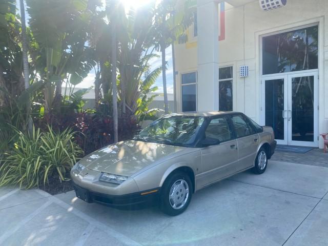 1995 Gold /Tan Saturn SL LOW MILES 70,805 (1G8ZH5282SZ) with an 1.9L 4-Cyl Engine engine, Automatic transmission, located at 4701 North Dixie Hwy, Pompano Beach, FL, 33064, (954) 422-2889, 26.240938, -80.123474 - OUR WEBPAGE FLORIDACARS1.COM HAS OVER 100 PHOTOS AND FREE CARFAX LINK 1995 SATURN S-SERIES SL1 ONE OF A KIND FIND DRIVES AMAZING VERY DEPENDABLE VIN: 1G8ZH5282SZ152130 1 G 8 Z H 5 2 8 2 S Z 1 5 2 1 3 0 SEDAN 4 DR 1.9L I4 F SOHC GASOLINE FRONT WHEEL DRIVE Features Air Conditioning AM/FM Stereo Automa - Photo#29