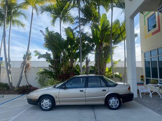 1995 Gold /Tan Saturn SL LOW MILES 70,805 (1G8ZH5282SZ) with an 1.9L 4-Cyl Engine engine, Automatic transmission, located at 4701 North Dixie Hwy, Pompano Beach, FL, 33064, (954) 422-2889, 26.240938, -80.123474 - OUR WEBPAGE FLORIDACARS1.COM HAS OVER 100 PHOTOS AND FREE CARFAX LINK 1995 SATURN S-SERIES SL1 ONE OF A KIND FIND DRIVES AMAZING VERY DEPENDABLE VIN: 1G8ZH5282SZ152130 1 G 8 Z H 5 2 8 2 S Z 1 5 2 1 3 0 SEDAN 4 DR 1.9L I4 F SOHC GASOLINE FRONT WHEEL DRIVE Features Air Conditioning AM/FM Stereo Automa - Photo#31