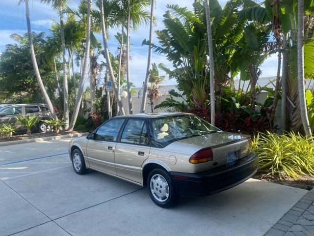 1995 Gold /Tan Saturn SL LOW MILES 70,805 (1G8ZH5282SZ) with an 1.9L 4-Cyl Engine engine, Automatic transmission, located at 4701 North Dixie Hwy, Pompano Beach, FL, 33064, (954) 422-2889, 26.240938, -80.123474 - OUR WEBPAGE FLORIDACARS1.COM HAS OVER 100 PHOTOS AND FREE CARFAX LINK 1995 SATURN S-SERIES SL1 ONE OF A KIND FIND DRIVES AMAZING VERY DEPENDABLE VIN: 1G8ZH5282SZ152130 1 G 8 Z H 5 2 8 2 S Z 1 5 2 1 3 0 SEDAN 4 DR 1.9L I4 F SOHC GASOLINE FRONT WHEEL DRIVE Features Air Conditioning AM/FM Stereo Automa - Photo#33