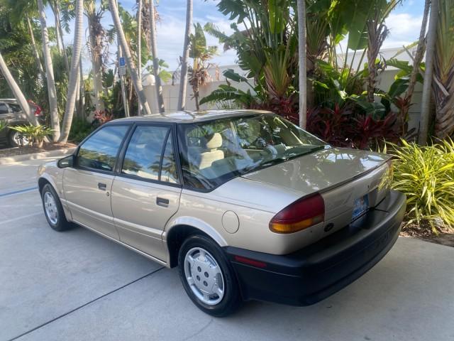 1995 Gold /Tan Saturn SL LOW MILES 70,805 (1G8ZH5282SZ) with an 1.9L 4-Cyl Engine engine, Automatic transmission, located at 4701 North Dixie Hwy, Pompano Beach, FL, 33064, (954) 422-2889, 26.240938, -80.123474 - OUR WEBPAGE FLORIDACARS1.COM HAS OVER 100 PHOTOS AND FREE CARFAX LINK 1995 SATURN S-SERIES SL1 ONE OF A KIND FIND DRIVES AMAZING VERY DEPENDABLE VIN: 1G8ZH5282SZ152130 1 G 8 Z H 5 2 8 2 S Z 1 5 2 1 3 0 SEDAN 4 DR 1.9L I4 F SOHC GASOLINE FRONT WHEEL DRIVE Features Air Conditioning AM/FM Stereo Automa - Photo#34