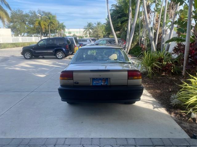 1995 Gold /Tan Saturn SL LOW MILES 70,805 (1G8ZH5282SZ) with an 1.9L 4-Cyl Engine engine, Automatic transmission, located at 4701 North Dixie Hwy, Pompano Beach, FL, 33064, (954) 422-2889, 26.240938, -80.123474 - OUR WEBPAGE FLORIDACARS1.COM HAS OVER 100 PHOTOS AND FREE CARFAX LINK 1995 SATURN S-SERIES SL1 ONE OF A KIND FIND DRIVES AMAZING VERY DEPENDABLE VIN: 1G8ZH5282SZ152130 1 G 8 Z H 5 2 8 2 S Z 1 5 2 1 3 0 SEDAN 4 DR 1.9L I4 F SOHC GASOLINE FRONT WHEEL DRIVE Features Air Conditioning AM/FM Stereo Automa - Photo#35