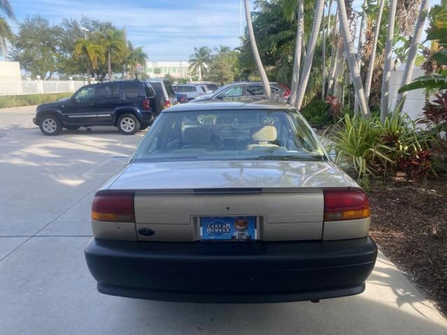 1995 Gold /Tan Saturn SL LOW MILES 70,805 (1G8ZH5282SZ) with an 1.9L 4-Cyl Engine engine, Automatic transmission, located at 4701 North Dixie Hwy, Pompano Beach, FL, 33064, (954) 422-2889, 26.240938, -80.123474 - OUR WEBPAGE FLORIDACARS1.COM HAS OVER 100 PHOTOS AND FREE CARFAX LINK 1995 SATURN S-SERIES SL1 ONE OF A KIND FIND DRIVES AMAZING VERY DEPENDABLE VIN: 1G8ZH5282SZ152130 1 G 8 Z H 5 2 8 2 S Z 1 5 2 1 3 0 SEDAN 4 DR 1.9L I4 F SOHC GASOLINE FRONT WHEEL DRIVE Features Air Conditioning AM/FM Stereo Automa - Photo#36