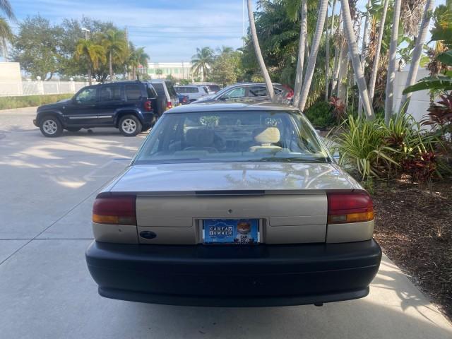 1995 Gold /Tan Saturn SL LOW MILES 70,805 (1G8ZH5282SZ) with an 1.9L 4-Cyl Engine engine, Automatic transmission, located at 4701 North Dixie Hwy, Pompano Beach, FL, 33064, (954) 422-2889, 26.240938, -80.123474 - OUR WEBPAGE FLORIDACARS1.COM HAS OVER 100 PHOTOS AND FREE CARFAX LINK 1995 SATURN S-SERIES SL1 ONE OF A KIND FIND DRIVES AMAZING VERY DEPENDABLE VIN: 1G8ZH5282SZ152130 1 G 8 Z H 5 2 8 2 S Z 1 5 2 1 3 0 SEDAN 4 DR 1.9L I4 F SOHC GASOLINE FRONT WHEEL DRIVE Features Air Conditioning AM/FM Stereo Automa - Photo#36