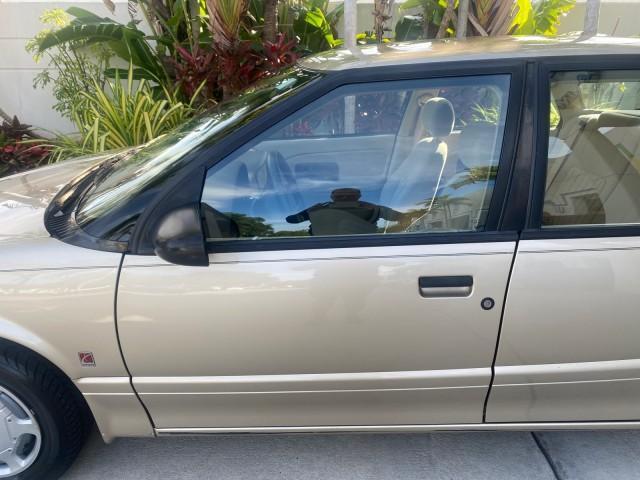 1995 Gold /Tan Saturn SL LOW MILES 70,805 (1G8ZH5282SZ) with an 1.9L 4-Cyl Engine engine, Automatic transmission, located at 4701 North Dixie Hwy, Pompano Beach, FL, 33064, (954) 422-2889, 26.240938, -80.123474 - OUR WEBPAGE FLORIDACARS1.COM HAS OVER 100 PHOTOS AND FREE CARFAX LINK 1995 SATURN S-SERIES SL1 ONE OF A KIND FIND DRIVES AMAZING VERY DEPENDABLE VIN: 1G8ZH5282SZ152130 1 G 8 Z H 5 2 8 2 S Z 1 5 2 1 3 0 SEDAN 4 DR 1.9L I4 F SOHC GASOLINE FRONT WHEEL DRIVE Features Air Conditioning AM/FM Stereo Automa - Photo#38
