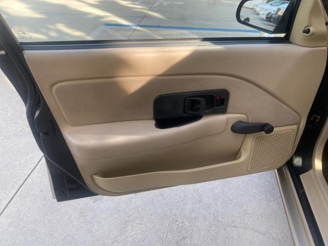 1995 Gold /Tan Saturn SL LOW MILES 70,805 (1G8ZH5282SZ) with an 1.9L 4-Cyl Engine engine, Automatic transmission, located at 4701 North Dixie Hwy, Pompano Beach, FL, 33064, (954) 422-2889, 26.240938, -80.123474 - OUR WEBPAGE FLORIDACARS1.COM HAS OVER 100 PHOTOS AND FREE CARFAX LINK 1995 SATURN S-SERIES SL1 ONE OF A KIND FIND DRIVES AMAZING VERY DEPENDABLE VIN: 1G8ZH5282SZ152130 1 G 8 Z H 5 2 8 2 S Z 1 5 2 1 3 0 SEDAN 4 DR 1.9L I4 F SOHC GASOLINE FRONT WHEEL DRIVE Features Air Conditioning AM/FM Stereo Automa - Photo#42