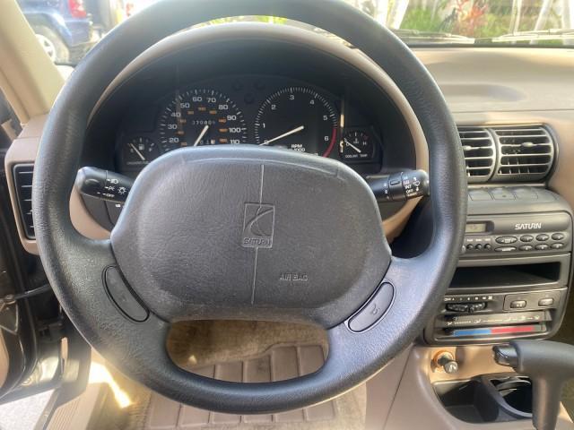 1995 Gold /Tan Saturn SL LOW MILES 70,805 (1G8ZH5282SZ) with an 1.9L 4-Cyl Engine engine, Automatic transmission, located at 4701 North Dixie Hwy, Pompano Beach, FL, 33064, (954) 422-2889, 26.240938, -80.123474 - OUR WEBPAGE FLORIDACARS1.COM HAS OVER 100 PHOTOS AND FREE CARFAX LINK 1995 SATURN S-SERIES SL1 ONE OF A KIND FIND DRIVES AMAZING VERY DEPENDABLE VIN: 1G8ZH5282SZ152130 1 G 8 Z H 5 2 8 2 S Z 1 5 2 1 3 0 SEDAN 4 DR 1.9L I4 F SOHC GASOLINE FRONT WHEEL DRIVE Features Air Conditioning AM/FM Stereo Automa - Photo#49