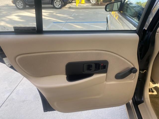 1995 Gold /Tan Saturn SL LOW MILES 70,805 (1G8ZH5282SZ) with an 1.9L 4-Cyl Engine engine, Automatic transmission, located at 4701 North Dixie Hwy, Pompano Beach, FL, 33064, (954) 422-2889, 26.240938, -80.123474 - OUR WEBPAGE FLORIDACARS1.COM HAS OVER 100 PHOTOS AND FREE CARFAX LINK 1995 SATURN S-SERIES SL1 ONE OF A KIND FIND DRIVES AMAZING VERY DEPENDABLE VIN: 1G8ZH5282SZ152130 1 G 8 Z H 5 2 8 2 S Z 1 5 2 1 3 0 SEDAN 4 DR 1.9L I4 F SOHC GASOLINE FRONT WHEEL DRIVE Features Air Conditioning AM/FM Stereo Automa - Photo#71