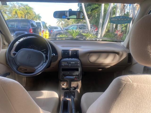 1995 Gold /Tan Saturn SL LOW MILES 70,805 (1G8ZH5282SZ) with an 1.9L 4-Cyl Engine engine, Automatic transmission, located at 4701 North Dixie Hwy, Pompano Beach, FL, 33064, (954) 422-2889, 26.240938, -80.123474 - OUR WEBPAGE FLORIDACARS1.COM HAS OVER 100 PHOTOS AND FREE CARFAX LINK 1995 SATURN S-SERIES SL1 ONE OF A KIND FIND DRIVES AMAZING VERY DEPENDABLE VIN: 1G8ZH5282SZ152130 1 G 8 Z H 5 2 8 2 S Z 1 5 2 1 3 0 SEDAN 4 DR 1.9L I4 F SOHC GASOLINE FRONT WHEEL DRIVE Features Air Conditioning AM/FM Stereo Automa - Photo#78