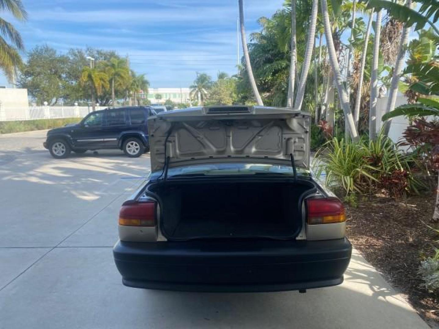 1995 Gold /Tan Saturn SL LOW MILES 70,805 (1G8ZH5282SZ) with an 1.9L 4-Cyl Engine engine, Automatic transmission, located at 4701 North Dixie Hwy, Pompano Beach, FL, 33064, (954) 422-2889, 26.240938, -80.123474 - OUR WEBPAGE FLORIDACARS1.COM HAS OVER 100 PHOTOS AND FREE CARFAX LINK 1995 SATURN S-SERIES SL1 ONE OF A KIND FIND DRIVES AMAZING VERY DEPENDABLE VIN: 1G8ZH5282SZ152130 1 G 8 Z H 5 2 8 2 S Z 1 5 2 1 3 0 SEDAN 4 DR 1.9L I4 F SOHC GASOLINE FRONT WHEEL DRIVE Features Air Conditioning AM/FM Stereo Automa - Photo#86