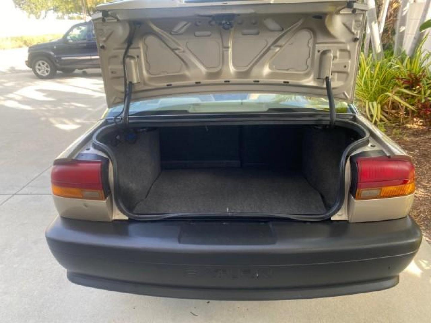 1995 Gold /Tan Saturn SL LOW MILES 70,805 (1G8ZH5282SZ) with an 1.9L 4-Cyl Engine engine, Automatic transmission, located at 4701 North Dixie Hwy, Pompano Beach, FL, 33064, (954) 422-2889, 26.240938, -80.123474 - OUR WEBPAGE FLORIDACARS1.COM HAS OVER 100 PHOTOS AND FREE CARFAX LINK 1995 SATURN S-SERIES SL1 ONE OF A KIND FIND DRIVES AMAZING VERY DEPENDABLE VIN: 1G8ZH5282SZ152130 1 G 8 Z H 5 2 8 2 S Z 1 5 2 1 3 0 SEDAN 4 DR 1.9L I4 F SOHC GASOLINE FRONT WHEEL DRIVE Features Air Conditioning AM/FM Stereo Automa - Photo#87