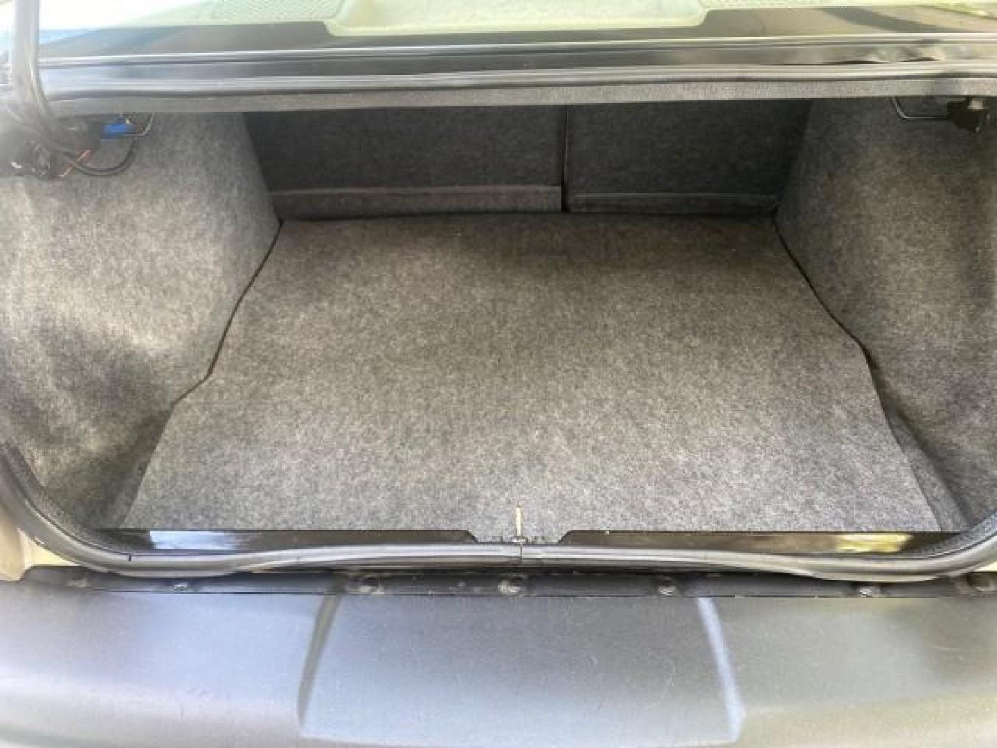 1995 Gold /Tan Saturn SL LOW MILES 70,805 (1G8ZH5282SZ) with an 1.9L 4-Cyl Engine engine, Automatic transmission, located at 4701 North Dixie Hwy, Pompano Beach, FL, 33064, (954) 422-2889, 26.240938, -80.123474 - OUR WEBPAGE FLORIDACARS1.COM HAS OVER 100 PHOTOS AND FREE CARFAX LINK 1995 SATURN S-SERIES SL1 ONE OF A KIND FIND DRIVES AMAZING VERY DEPENDABLE VIN: 1G8ZH5282SZ152130 1 G 8 Z H 5 2 8 2 S Z 1 5 2 1 3 0 SEDAN 4 DR 1.9L I4 F SOHC GASOLINE FRONT WHEEL DRIVE Features Air Conditioning AM/FM Stereo Automa - Photo#88