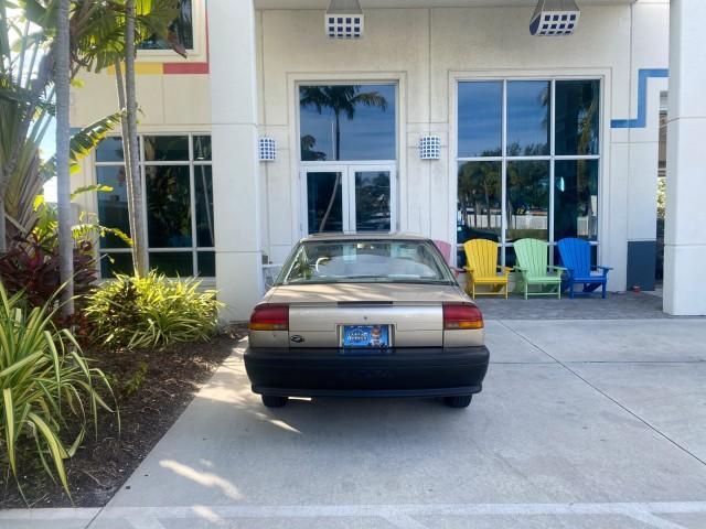 1995 Gold /Tan Saturn SL LOW MILES 70,805 (1G8ZH5282SZ) with an 1.9L 4-Cyl Engine engine, Automatic transmission, located at 4701 North Dixie Hwy, Pompano Beach, FL, 33064, (954) 422-2889, 26.240938, -80.123474 - OUR WEBPAGE FLORIDACARS1.COM HAS OVER 100 PHOTOS AND FREE CARFAX LINK 1995 SATURN S-SERIES SL1 ONE OF A KIND FIND DRIVES AMAZING VERY DEPENDABLE VIN: 1G8ZH5282SZ152130 1 G 8 Z H 5 2 8 2 S Z 1 5 2 1 3 0 SEDAN 4 DR 1.9L I4 F SOHC GASOLINE FRONT WHEEL DRIVE Features Air Conditioning AM/FM Stereo Automa - Photo#90