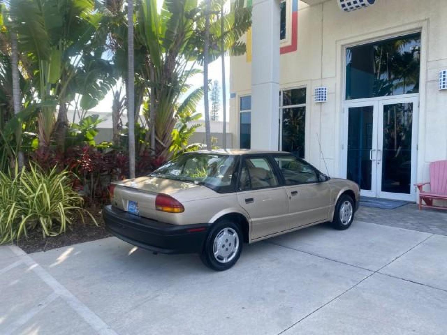 1995 Gold /Tan Saturn SL LOW MILES 70,805 (1G8ZH5282SZ) with an 1.9L 4-Cyl Engine engine, Automatic transmission, located at 4701 North Dixie Hwy, Pompano Beach, FL, 33064, (954) 422-2889, 26.240938, -80.123474 - OUR WEBPAGE FLORIDACARS1.COM HAS OVER 100 PHOTOS AND FREE CARFAX LINK 1995 SATURN S-SERIES SL1 ONE OF A KIND FIND DRIVES AMAZING VERY DEPENDABLE VIN: 1G8ZH5282SZ152130 1 G 8 Z H 5 2 8 2 S Z 1 5 2 1 3 0 SEDAN 4 DR 1.9L I4 F SOHC GASOLINE FRONT WHEEL DRIVE Features Air Conditioning AM/FM Stereo Automa - Photo#92