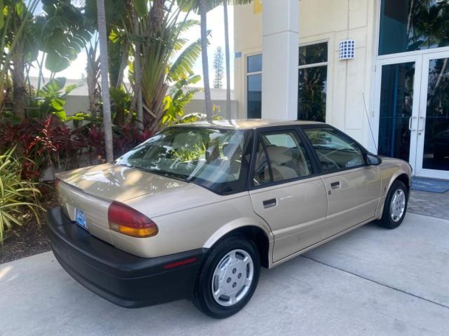 1995 Gold /Tan Saturn SL LOW MILES 70,805 (1G8ZH5282SZ) with an 1.9L 4-Cyl Engine engine, Automatic transmission, located at 4701 North Dixie Hwy, Pompano Beach, FL, 33064, (954) 422-2889, 26.240938, -80.123474 - OUR WEBPAGE FLORIDACARS1.COM HAS OVER 100 PHOTOS AND FREE CARFAX LINK 1995 SATURN S-SERIES SL1 ONE OF A KIND FIND DRIVES AMAZING VERY DEPENDABLE VIN: 1G8ZH5282SZ152130 1 G 8 Z H 5 2 8 2 S Z 1 5 2 1 3 0 SEDAN 4 DR 1.9L I4 F SOHC GASOLINE FRONT WHEEL DRIVE Features Air Conditioning AM/FM Stereo Automa - Photo#93