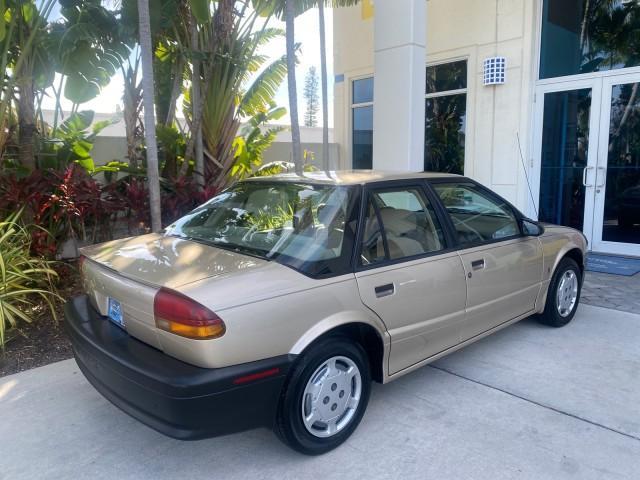 1995 Gold /Tan Saturn SL LOW MILES 70,805 (1G8ZH5282SZ) with an 1.9L 4-Cyl Engine engine, Automatic transmission, located at 4701 North Dixie Hwy, Pompano Beach, FL, 33064, (954) 422-2889, 26.240938, -80.123474 - OUR WEBPAGE FLORIDACARS1.COM HAS OVER 100 PHOTOS AND FREE CARFAX LINK 1995 SATURN S-SERIES SL1 ONE OF A KIND FIND DRIVES AMAZING VERY DEPENDABLE VIN: 1G8ZH5282SZ152130 1 G 8 Z H 5 2 8 2 S Z 1 5 2 1 3 0 SEDAN 4 DR 1.9L I4 F SOHC GASOLINE FRONT WHEEL DRIVE Features Air Conditioning AM/FM Stereo Automa - Photo#93