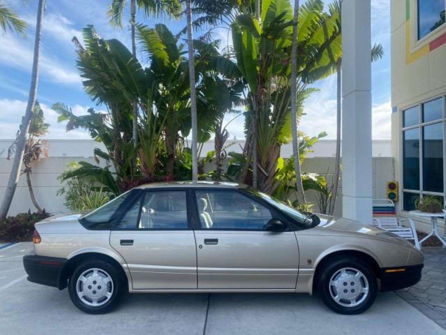 1995 Gold /Tan Saturn SL LOW MILES 70,805 (1G8ZH5282SZ) with an 1.9L 4-Cyl Engine engine, Automatic transmission, located at 4701 North Dixie Hwy, Pompano Beach, FL, 33064, (954) 422-2889, 26.240938, -80.123474 - OUR WEBPAGE FLORIDACARS1.COM HAS OVER 100 PHOTOS AND FREE CARFAX LINK 1995 SATURN S-SERIES SL1 ONE OF A KIND FIND DRIVES AMAZING VERY DEPENDABLE VIN: 1G8ZH5282SZ152130 1 G 8 Z H 5 2 8 2 S Z 1 5 2 1 3 0 SEDAN 4 DR 1.9L I4 F SOHC GASOLINE FRONT WHEEL DRIVE Features Air Conditioning AM/FM Stereo Automa - Photo#95
