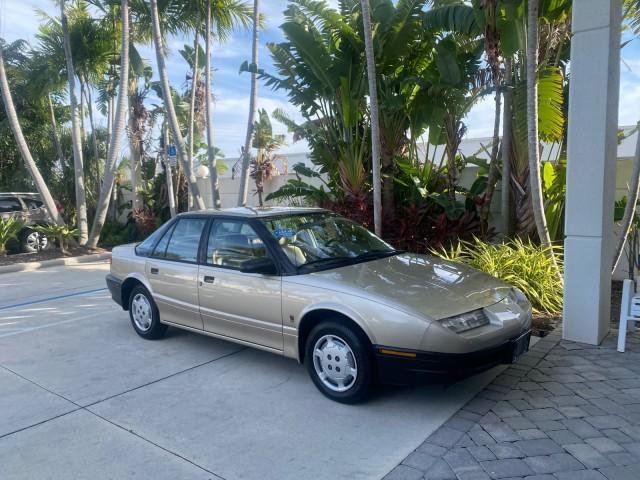 1995 Gold /Tan Saturn SL LOW MILES 70,805 (1G8ZH5282SZ) with an 1.9L 4-Cyl Engine engine, Automatic transmission, located at 4701 North Dixie Hwy, Pompano Beach, FL, 33064, (954) 422-2889, 26.240938, -80.123474 - OUR WEBPAGE FLORIDACARS1.COM HAS OVER 100 PHOTOS AND FREE CARFAX LINK 1995 SATURN S-SERIES SL1 ONE OF A KIND FIND DRIVES AMAZING VERY DEPENDABLE VIN: 1G8ZH5282SZ152130 1 G 8 Z H 5 2 8 2 S Z 1 5 2 1 3 0 SEDAN 4 DR 1.9L I4 F SOHC GASOLINE FRONT WHEEL DRIVE Features Air Conditioning AM/FM Stereo Automa - Photo#96