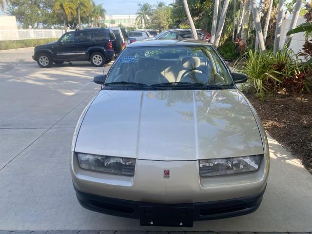 1995 Gold /Tan Saturn SL LOW MILES 70,805 (1G8ZH5282SZ) with an 1.9L 4-Cyl Engine engine, Automatic transmission, located at 4701 North Dixie Hwy, Pompano Beach, FL, 33064, (954) 422-2889, 26.240938, -80.123474 - OUR WEBPAGE FLORIDACARS1.COM HAS OVER 100 PHOTOS AND FREE CARFAX LINK 1995 SATURN S-SERIES SL1 ONE OF A KIND FIND DRIVES AMAZING VERY DEPENDABLE VIN: 1G8ZH5282SZ152130 1 G 8 Z H 5 2 8 2 S Z 1 5 2 1 3 0 SEDAN 4 DR 1.9L I4 F SOHC GASOLINE FRONT WHEEL DRIVE Features Air Conditioning AM/FM Stereo Automa - Photo#98